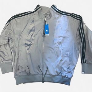 Adidas x Songs for the Mute Silver track Jacket with dark green Stripes